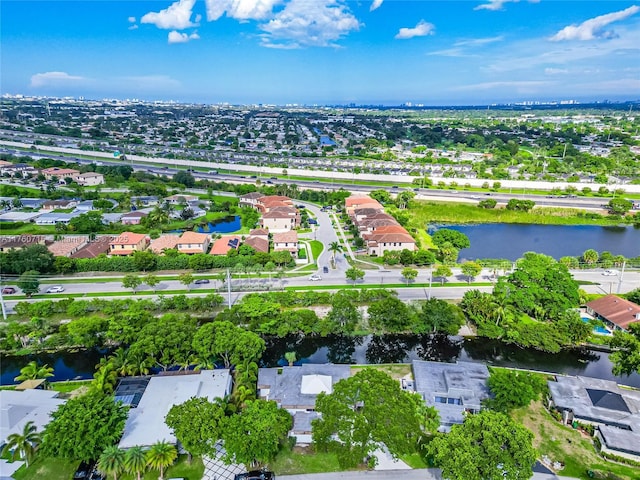 aerial view featuring a residential view and a water view