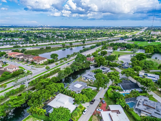 aerial view featuring a residential view and a water view