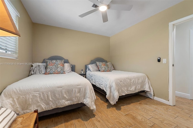 367 W Riverside Dr, Tequesta, FL 33469 - bedroom featuring light wood-style floors and ceiling fan