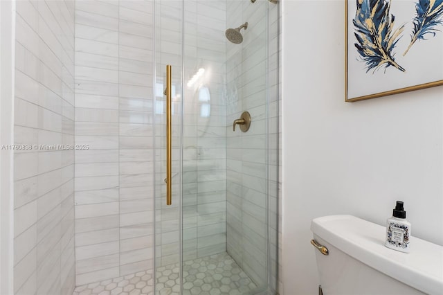 367 W Riverside Dr, Tequesta, FL 33469 - bathroom with a shower stall and toilet