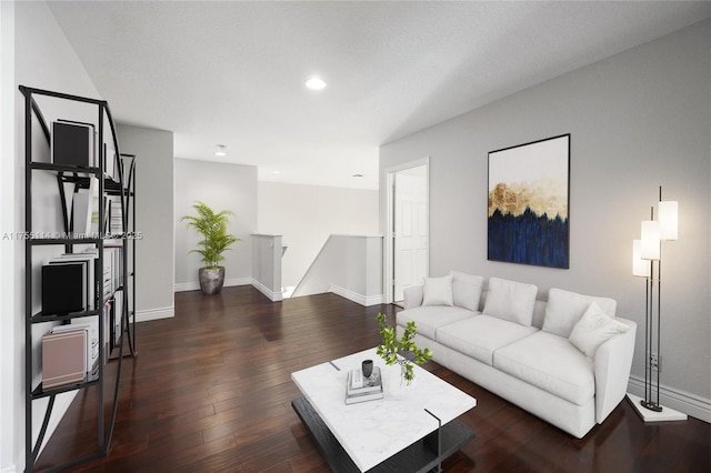 living area with recessed lighting, baseboards, and wood-type flooring