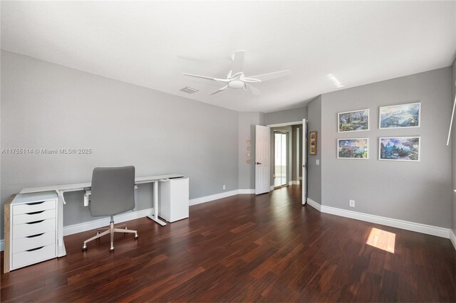 unfurnished office featuring wood finished floors, visible vents, baseboards, and ceiling fan