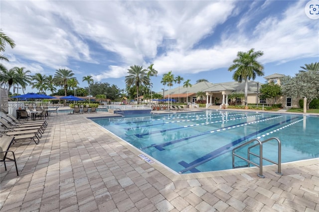 community pool with a patio