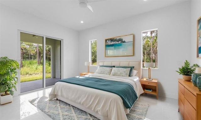 bedroom with recessed lighting, baseboards, and access to exterior