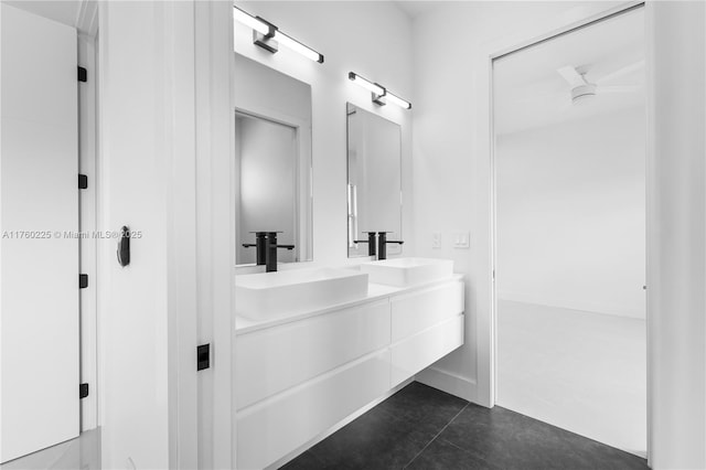 full bath featuring a sink and double vanity