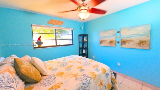 tiled bedroom with a ceiling fan