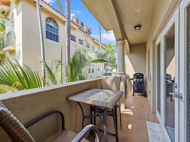 balcony featuring a grill