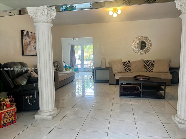 329 Minola Dr, Miami Springs, FL 33166 - living area with decorative columns, light tile patterned flooring, and french doors