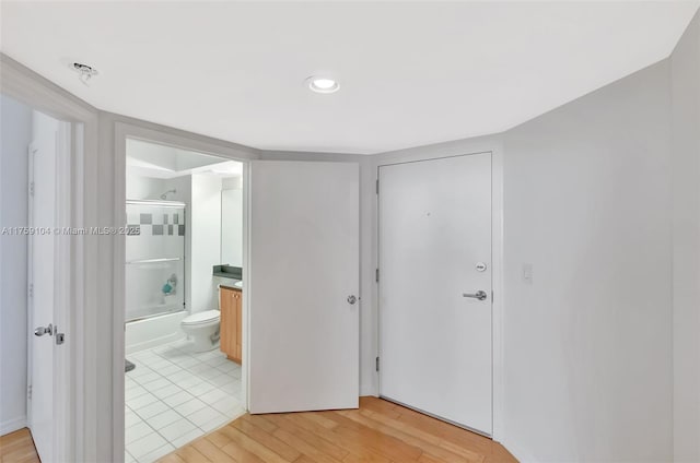 hall featuring light wood-style flooring