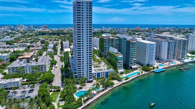 bird's eye view with a view of city and a water view