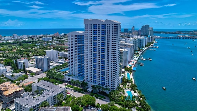 aerial view featuring a view of city and a water view