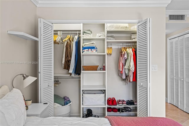 closet featuring visible vents