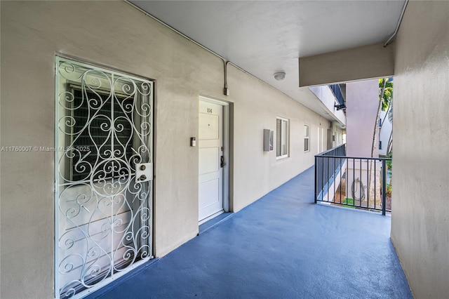 entrance to property with a balcony