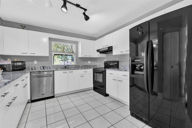 kitchen with black appliances, white cabinets, under cabinet range hood, and a sink