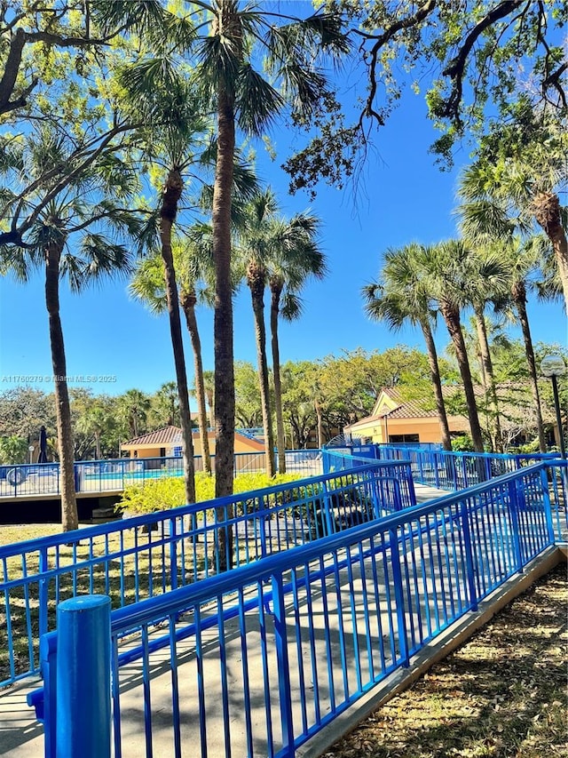 surrounding community featuring fence