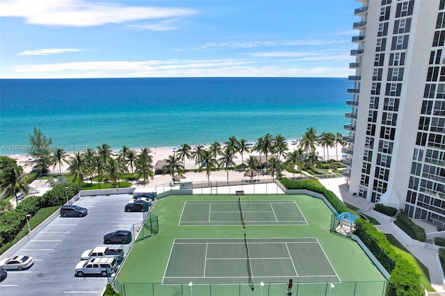 bird's eye view with a beach view and a water view