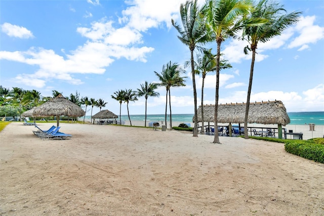 view of home's community with a gazebo and a water view