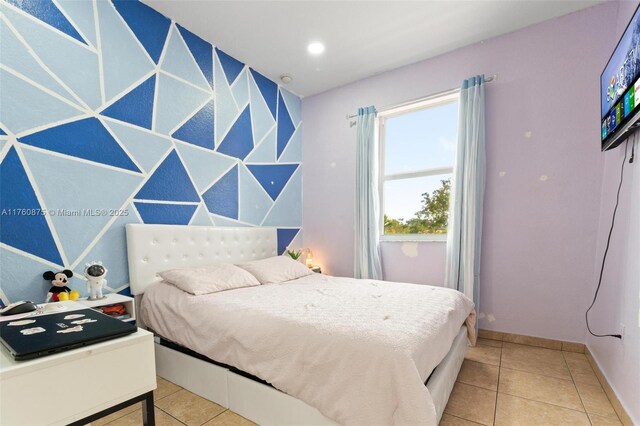 tiled bedroom with baseboards