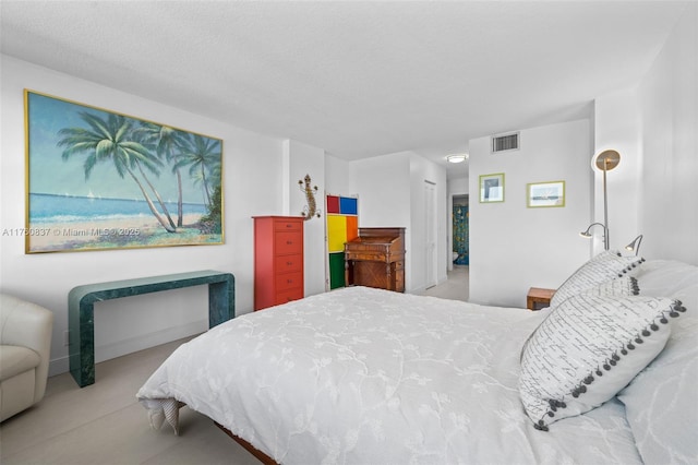 bedroom with visible vents and a closet