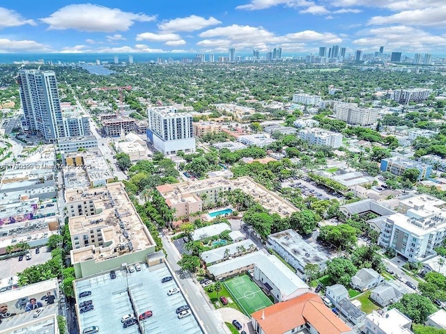 birds eye view of property with a view of city