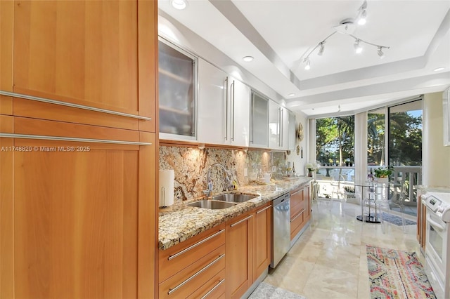 2000 Island Bl Unit 410, Aventura, FL 33160 - kitchen featuring a sink, a tray ceiling, light stone counters, decorative backsplash, and dishwasher