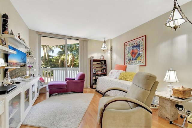 2000 Island Bl Unit 410, Aventura, FL 33160 - living area with a wall of windows and wood finished floors