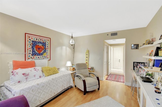 2000 Island Bl Unit 410, Aventura, FL 33160 - bedroom featuring light wood-type flooring, visible vents, and baseboards