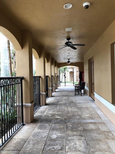 view of patio with a ceiling fan