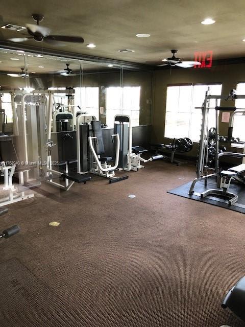 gym featuring a ceiling fan