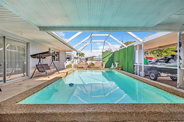 pool featuring a patio and a lanai