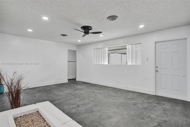 unfurnished living room with a ceiling fan, recessed lighting, visible vents, and baseboards