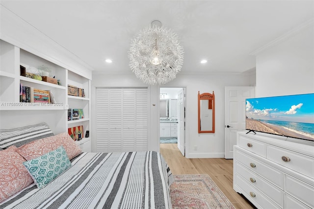 bedroom featuring baseboards, ornamental molding, recessed lighting, light wood-style floors, and ensuite bath