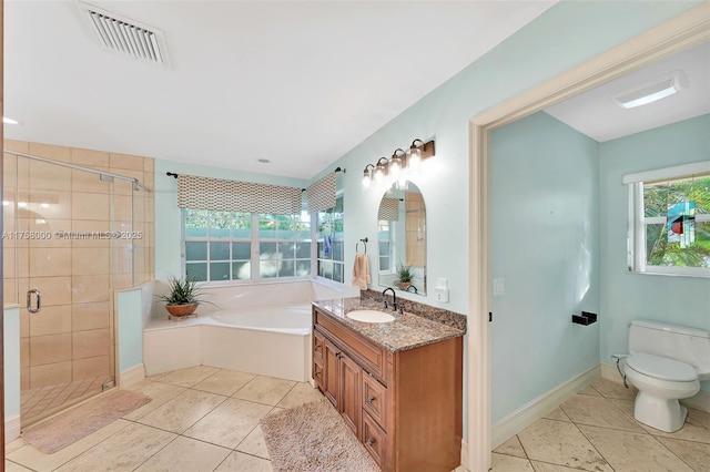 bathroom featuring a bath, visible vents, a stall shower, tile patterned flooring, and toilet