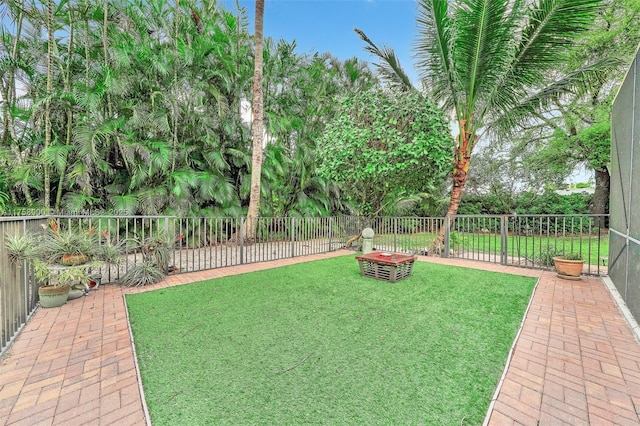 view of yard with a fenced backyard