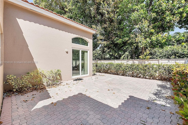 view of patio with fence