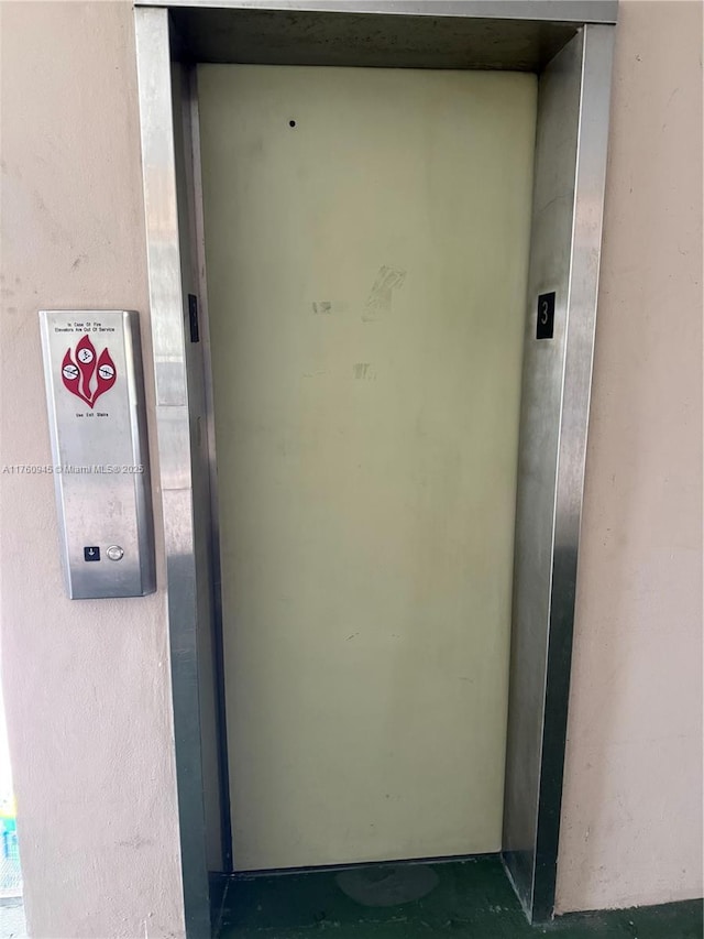 view of exterior entry with elevator