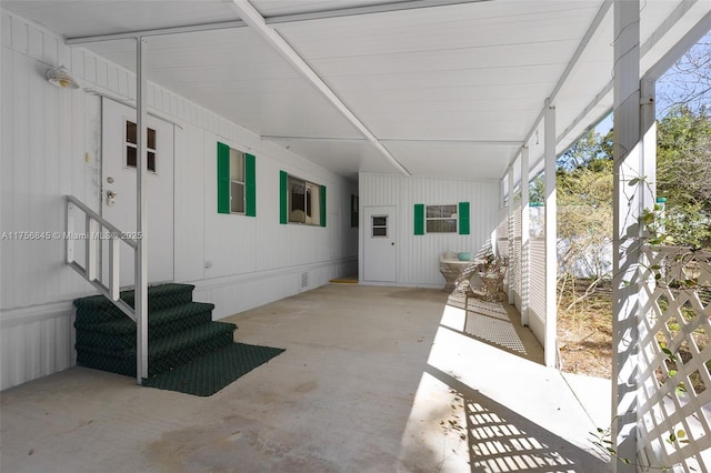 view of patio featuring a carport