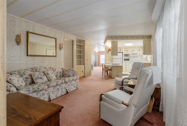 living room featuring light carpet