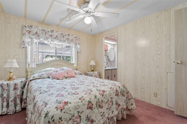 bedroom with wooden walls, ceiling fan, and carpet