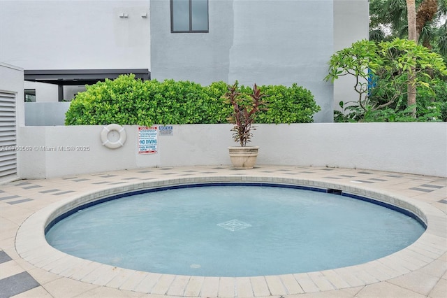 view of swimming pool featuring a swimming pool