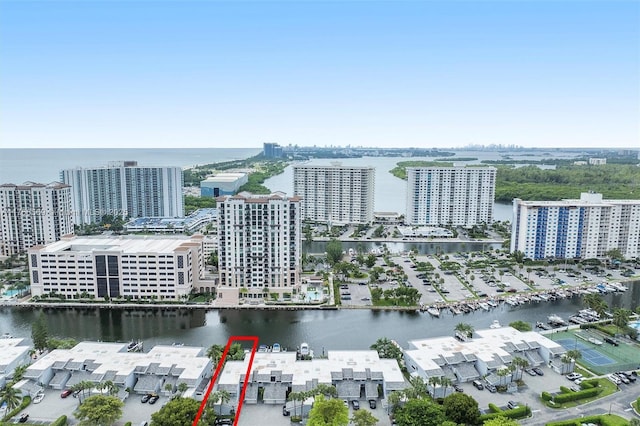 aerial view featuring a view of city and a water view