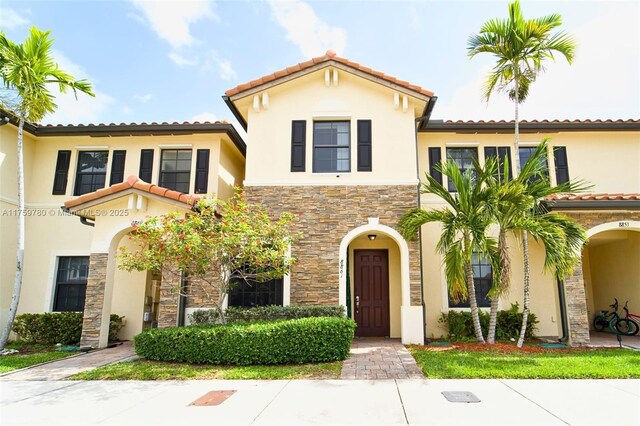 8861 W 35th Ave, Hialeah, FL 33018 - mediterranean / spanish house featuring stone siding and stucco siding