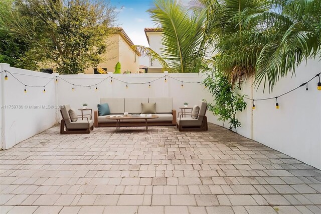 8861 W 35th Ave, Hialeah, FL 33018 - view of patio with outdoor lounge area and a fenced backyard