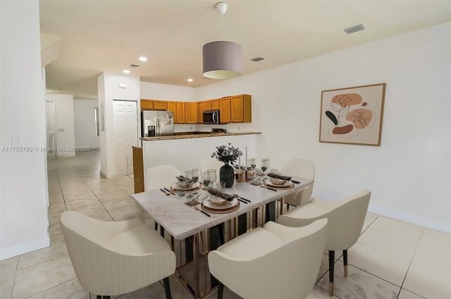 8861 W 35th Ave, Hialeah, FL 33018 - dining space featuring light tile patterned flooring, visible vents, recessed lighting, and baseboards
