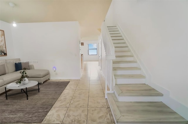 8861 W 35th Ave, Hialeah, FL 33018 - unfurnished living room with stairs and light tile patterned floors