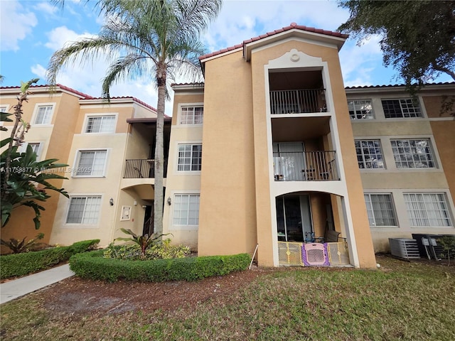 view of property with central AC unit