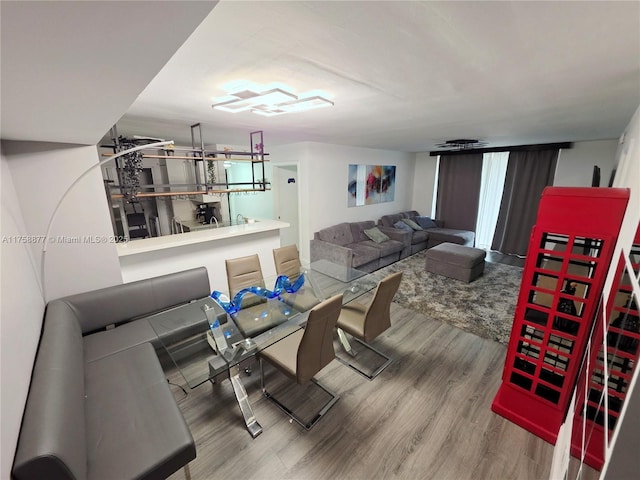 dining space featuring wood finished floors