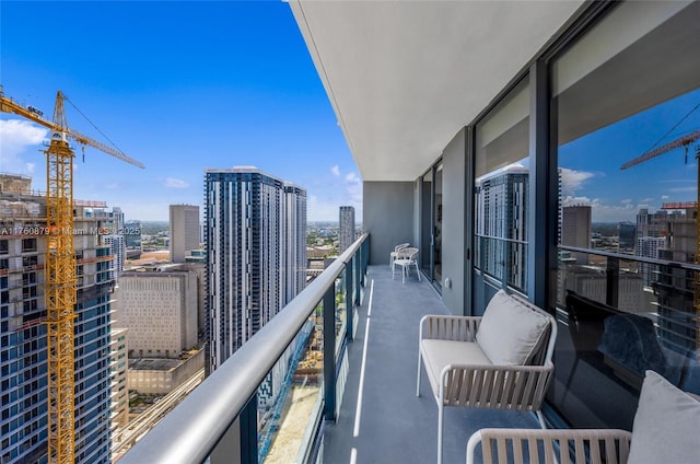 balcony featuring a view of city