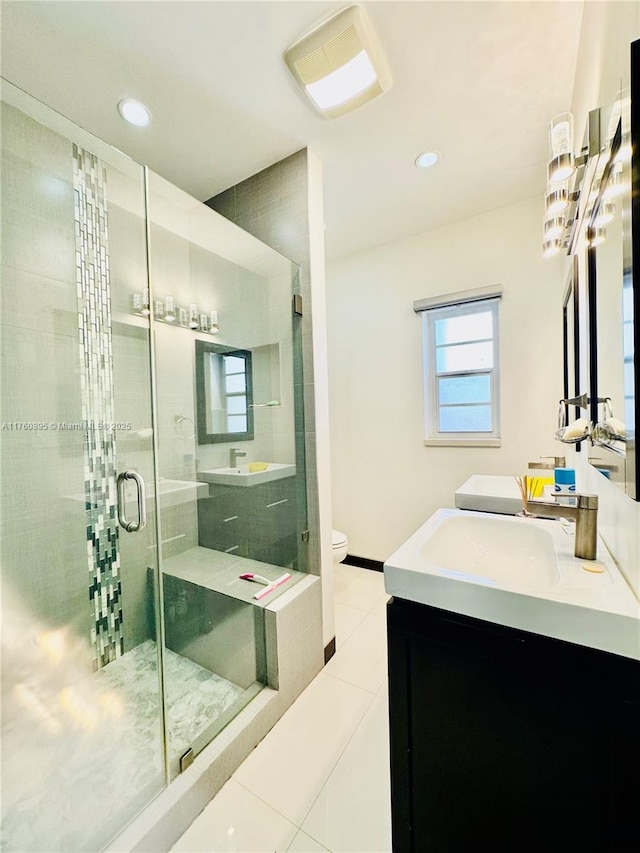 full bath with toilet, recessed lighting, a stall shower, tile patterned floors, and vanity