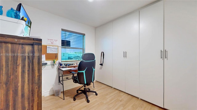 office area with light wood-type flooring